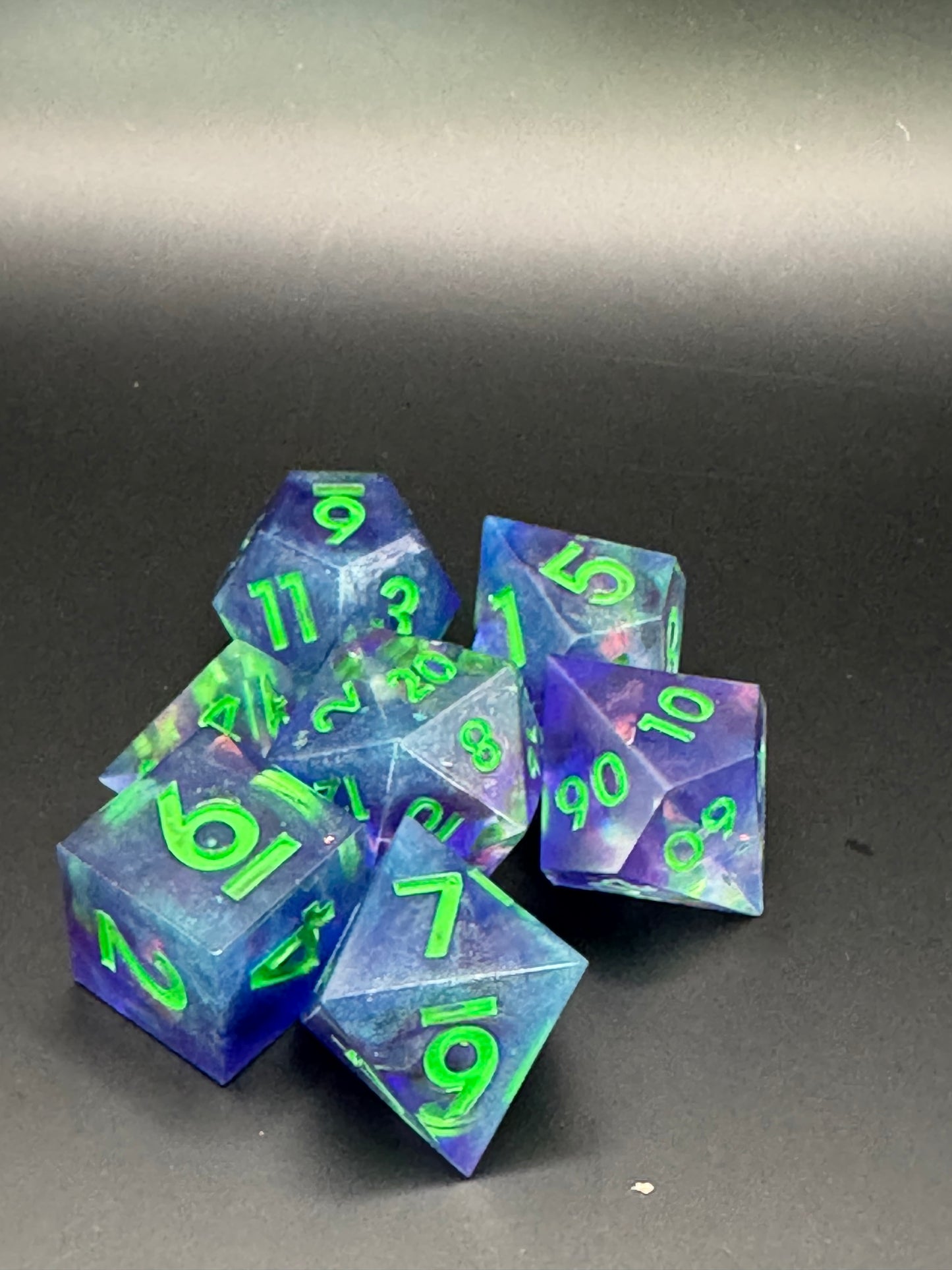 Enchanted Goblin’s Hoard – Purple UV Reactive Dice Set